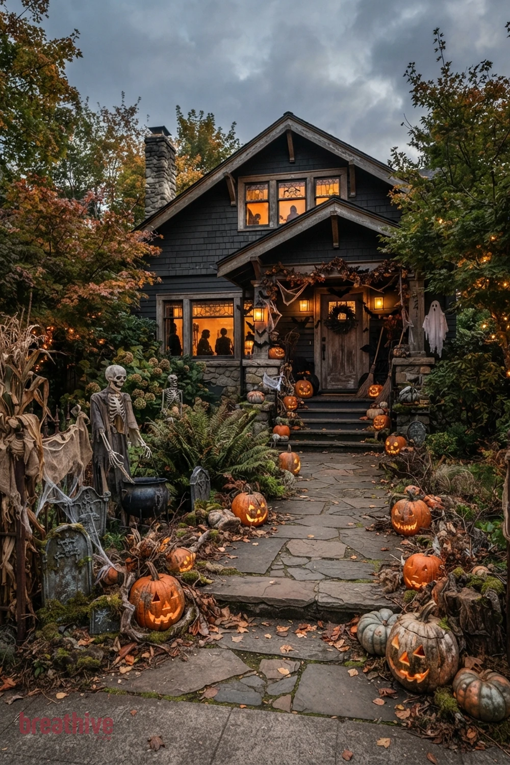 spooky aesthetic Halloween front yard idea with wide exterior setup showing the seasonal concept within the real yard, planting, path, and house context