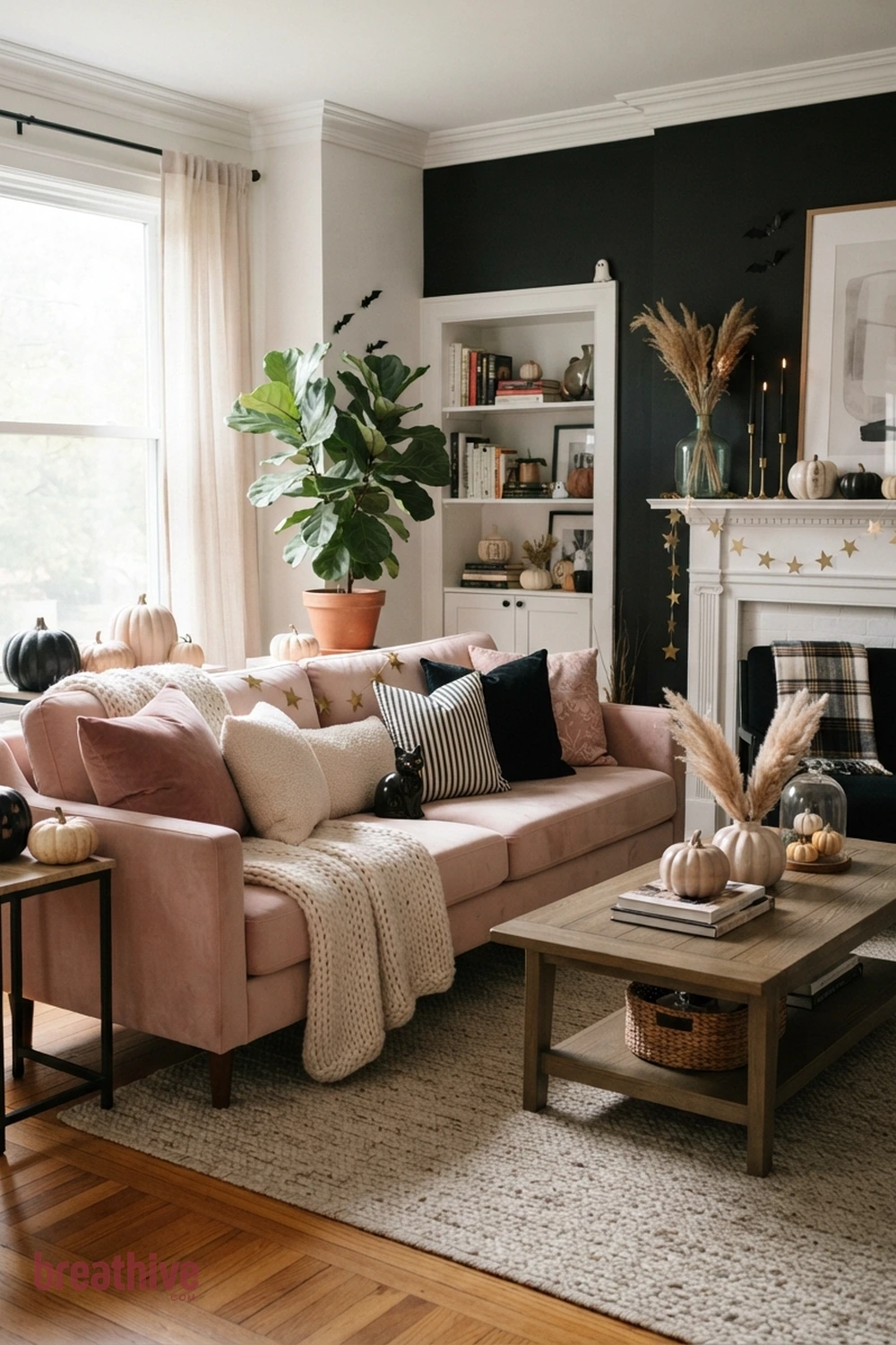 pink playful Halloween living room idea with sofa arrangement with layered pillows and throws while keeping seating comfortable