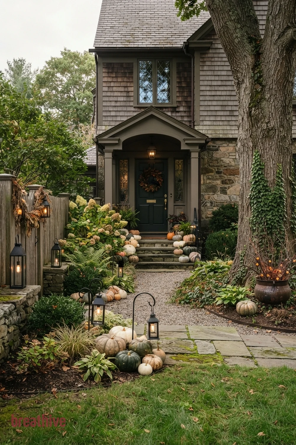 classy Halloween front yard and entry idea with garden bed, tree, fence, or lawn edge with seasonal decor integrated into existing landscape