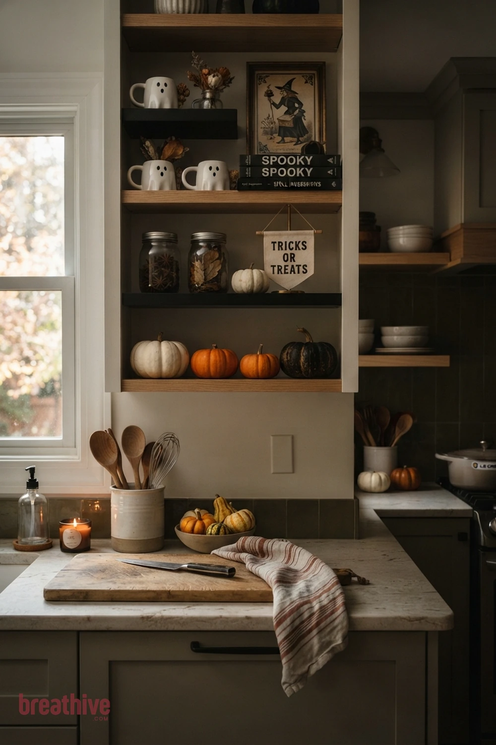 counter styling Halloween kitchen counter idea with vertical storage or display area styled with seasonal pieces while remaining organized