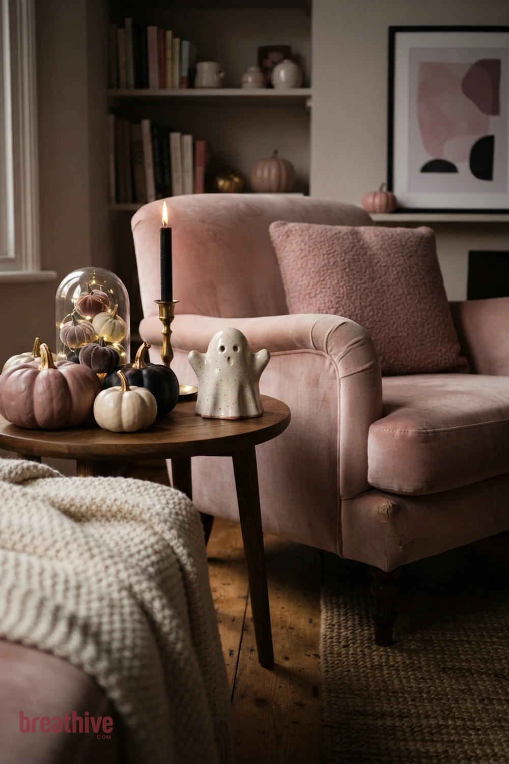 pink playful Halloween living room idea with close-up of fabric, ceramic, glass, wood, metal, and seasonal surface detail