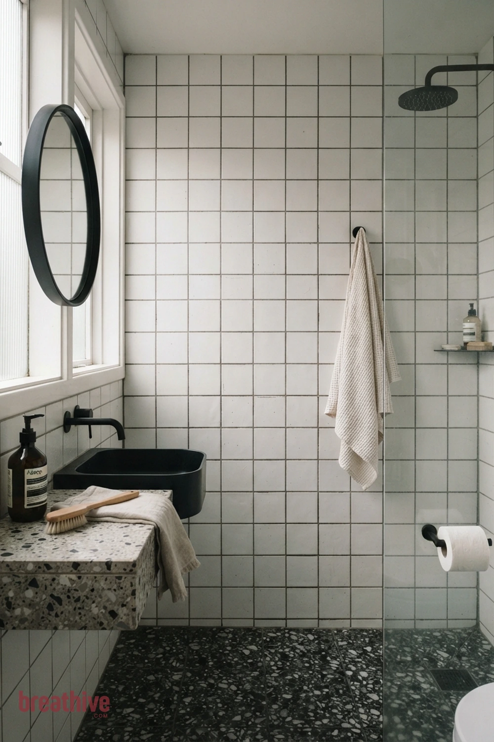Keep Grout Lines Simple in a Small Room in a black and white bathroom