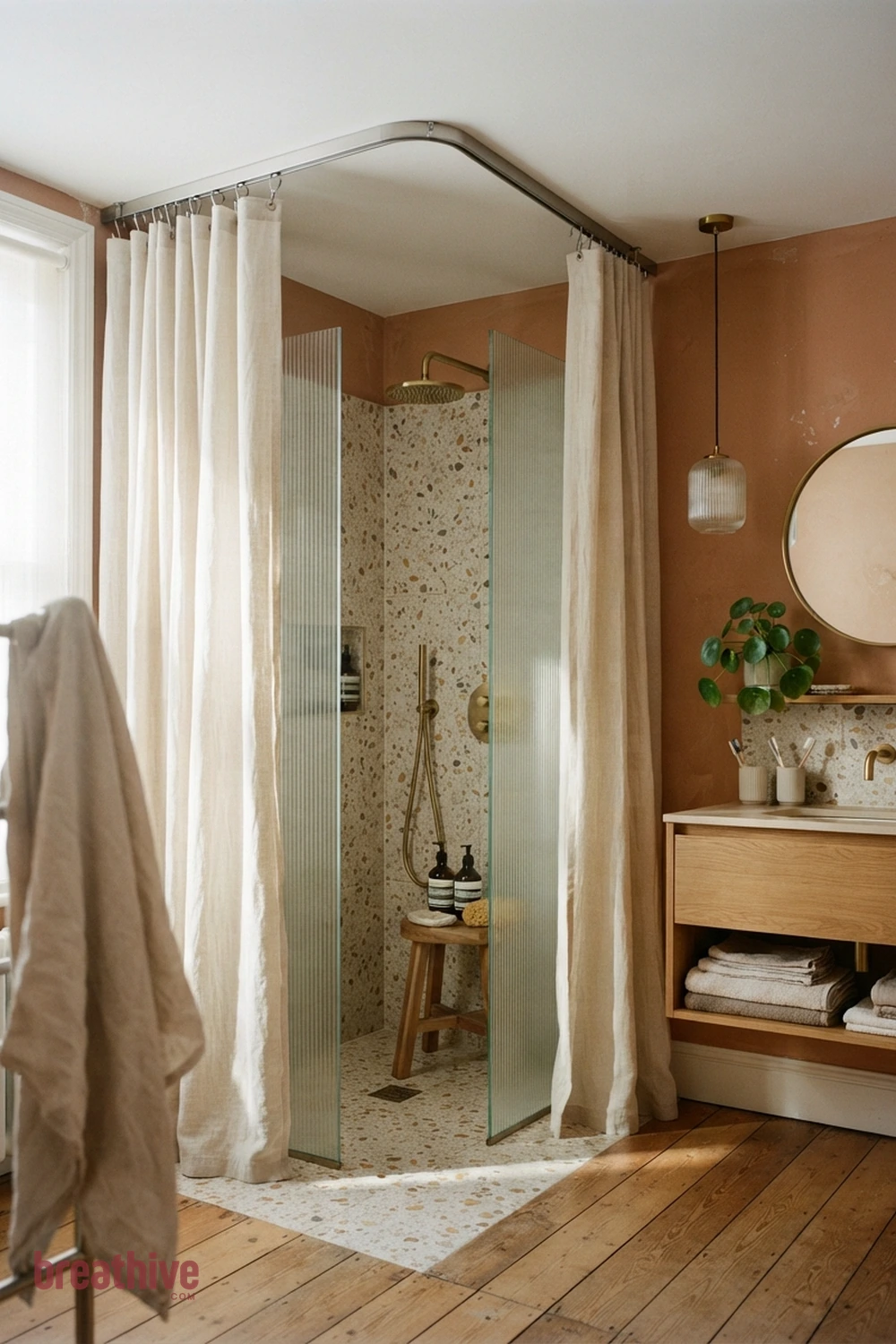 Use a Shower Curtain Track at Ceiling Height in a thoughtful bathroom