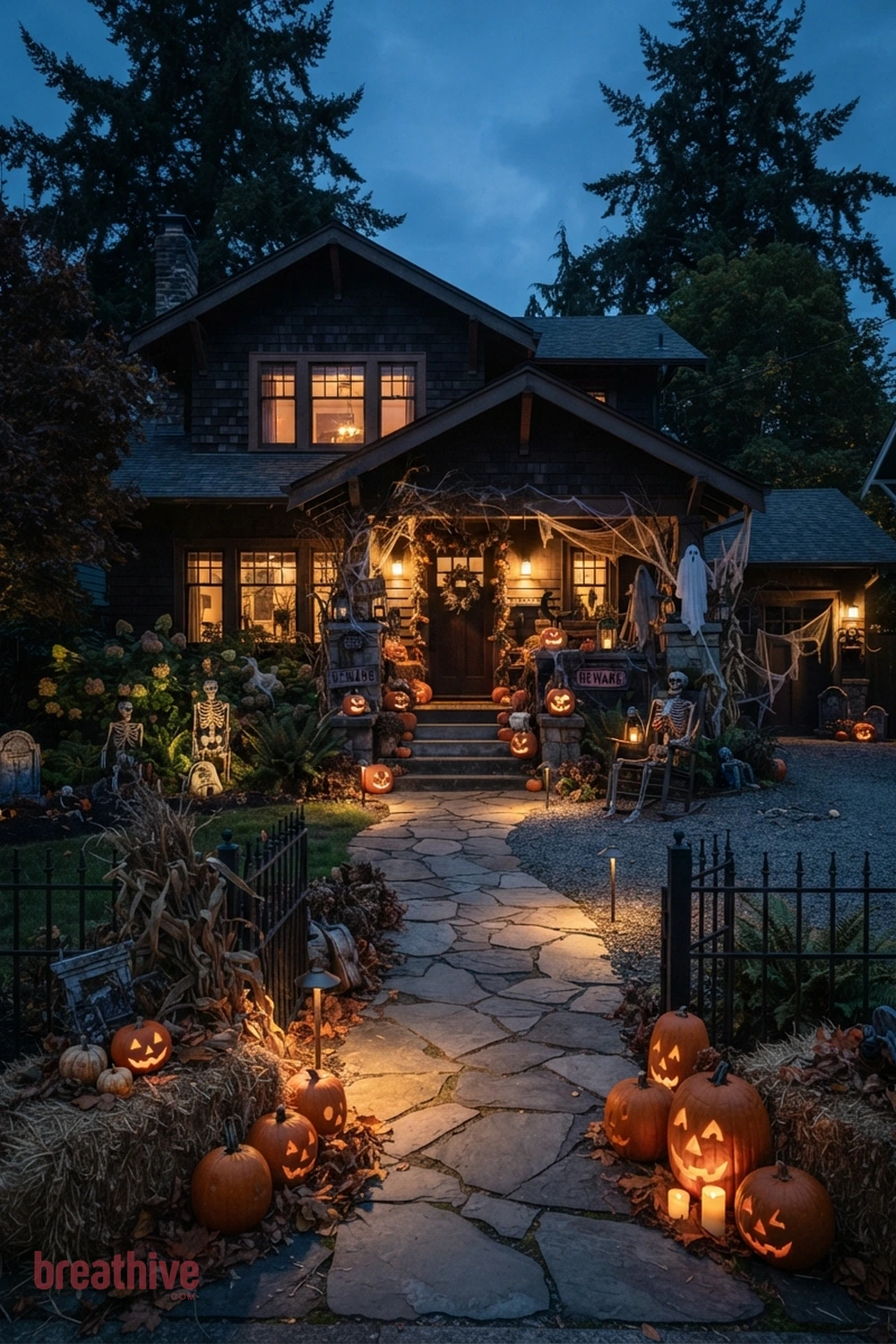 spooky aesthetic Halloween front yard idea with outdoor setup after dusk using practical, path-safe lighting and visible depth