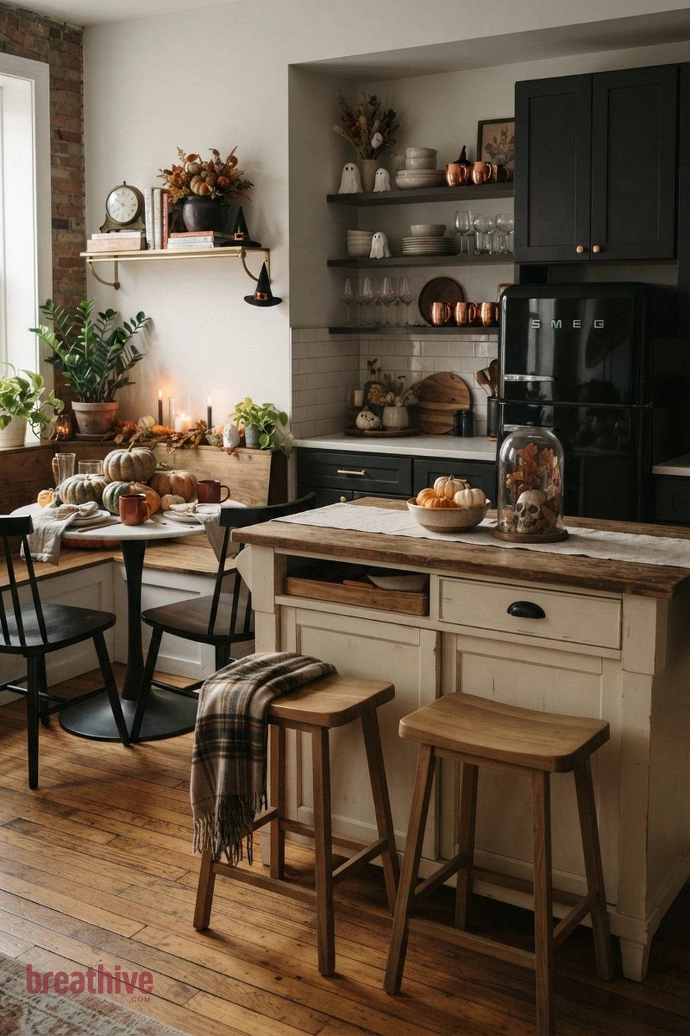 island-focused Halloween kitchen idea with compact apartment kitchen, breakfast nook, or narrow counter using a restrained seasonal grouping