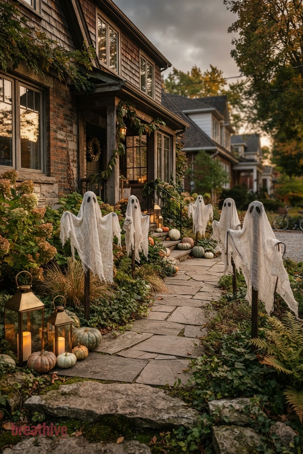 ghost-themed Halloween front yard idea with small front yard or narrow side path using fewer pieces with stronger placement