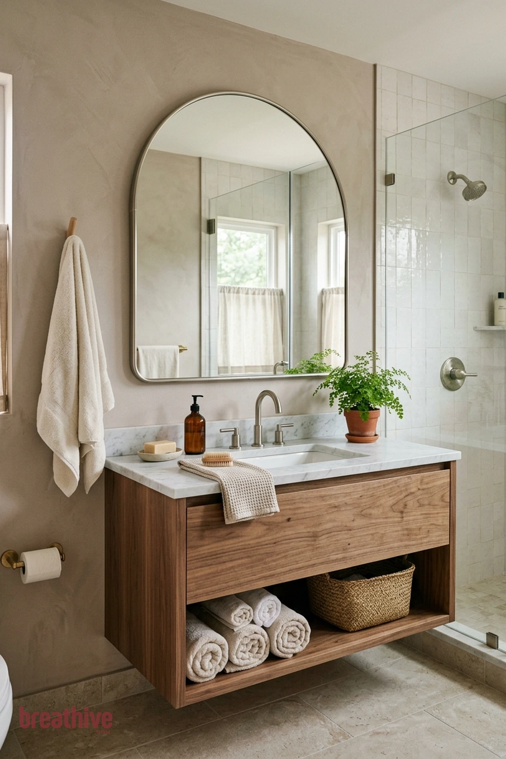 Choose a Curved Mirror for Softer Geometry in a thoughtful bathroom