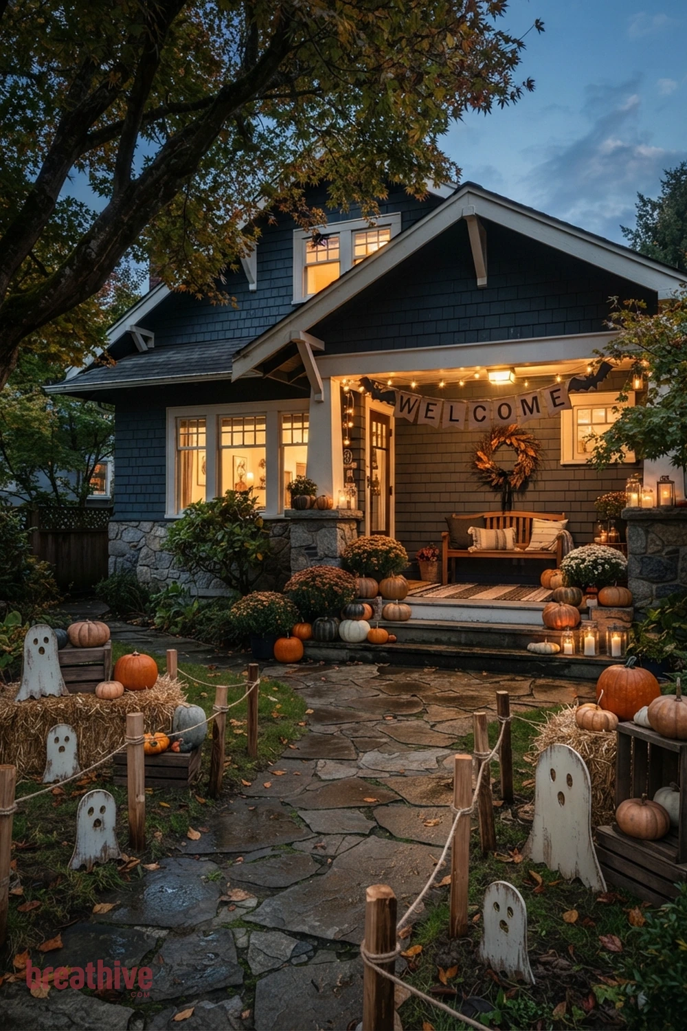 DIY outdoor Halloween front yard idea with foreground, middle-ground, and background seasonal elements creating depth without clutter
