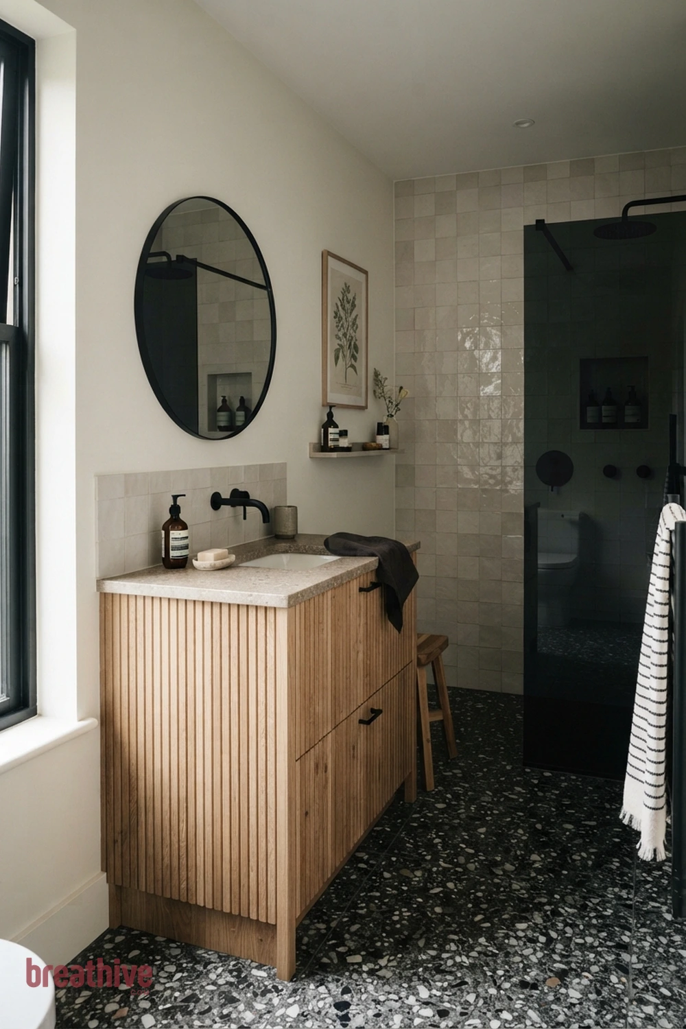 Bring Wood Texture Through Moisture-Suitable Finishes in a black and white bathroom