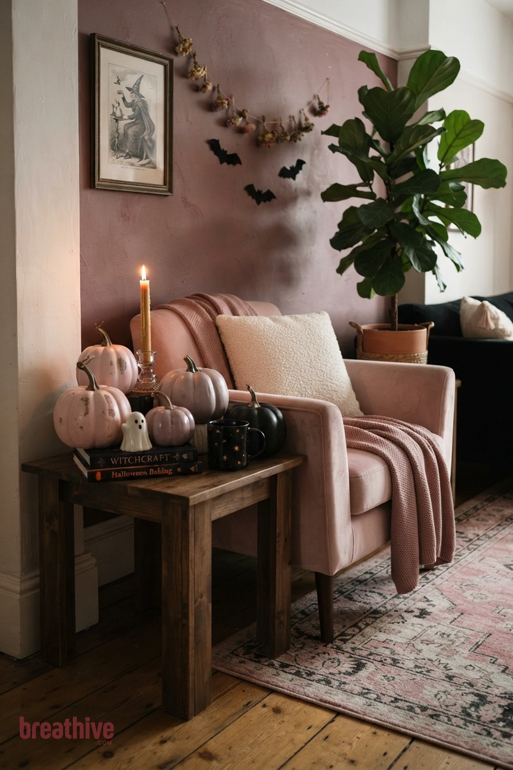 pink playful Halloween living room idea with focused vignette that demonstrates color repetition and controlled decorative density